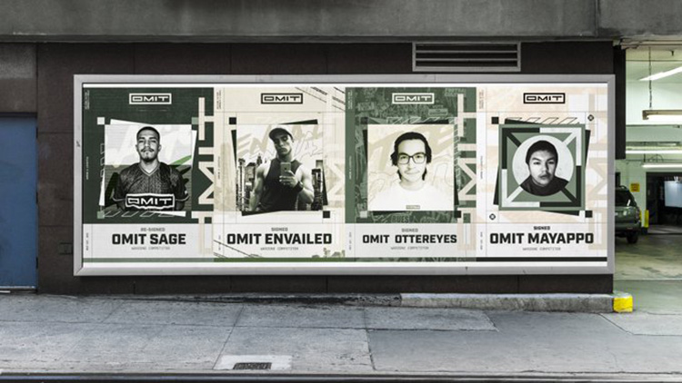 Image of OMIT posters on a house wall.